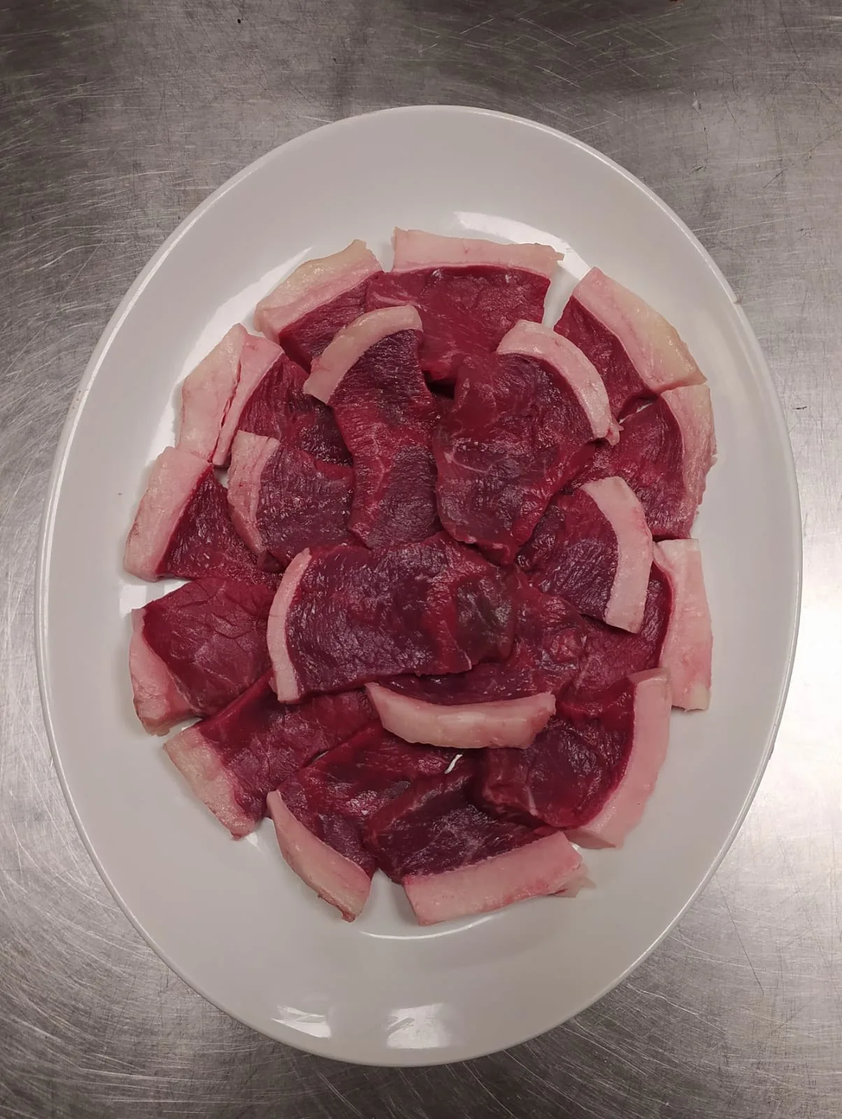 Carne fresca preparada para la parrilla